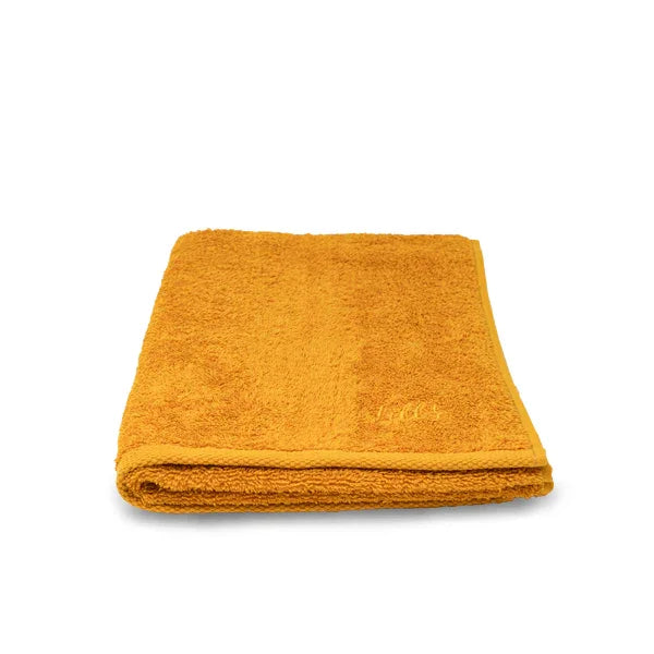 Hundehandtuch aus Bio-Baumwolle in Amber, gefaltet, Größe 50 x 100 cm